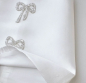 Preview: Edles klassisches Kleidchen im Seiden Look, Elfenbein mit Strass-Schleifchen